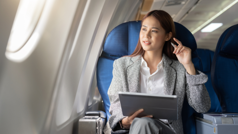 business owner thinking in an airplane